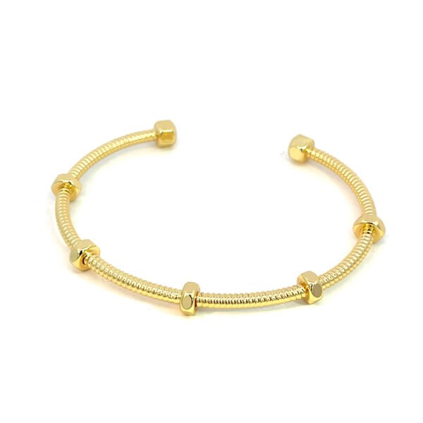 Pulsera tipo brazalete con forma de tuerca