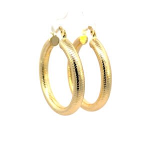 Arracada chunky tubular con lineas